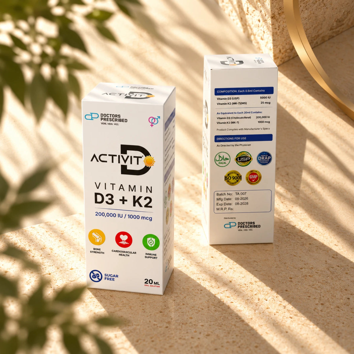 ACTIVIT-D Vitamin D3 + K2 oral solution, 20 ml, showing front packaging and composition panel on a sunlit stone surface.