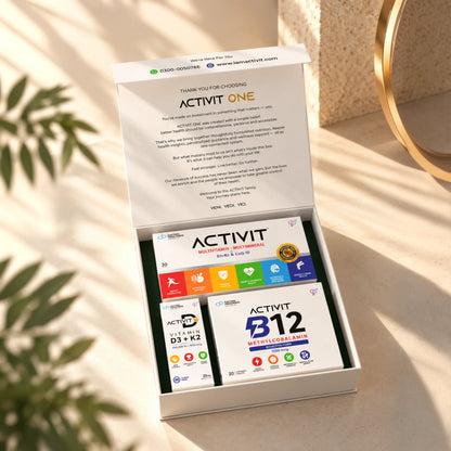 Open ACTIVIT ONE nutrition system box displaying multivitamin tablets, B12 chewable tablets and vitamin D3 + K2 oral solution in organized packaging.